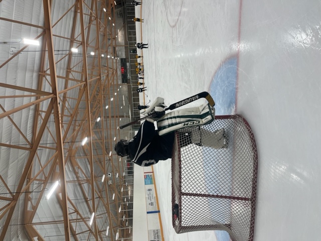 Dave, a blind ice hockey goalie, chilling on his hockey net